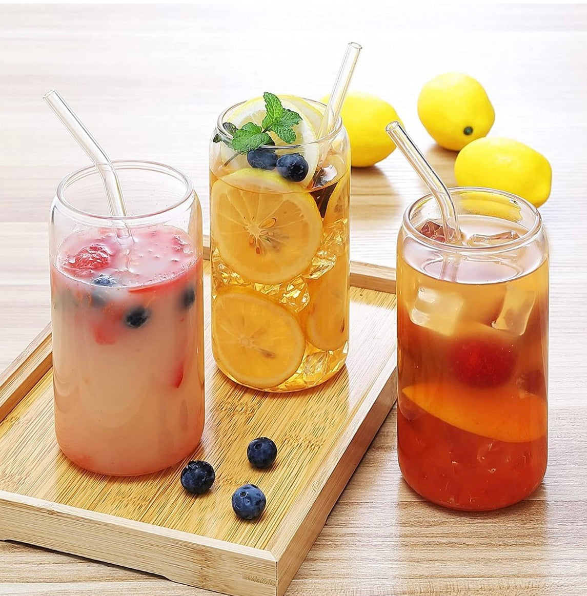 Glass cup with glass straw