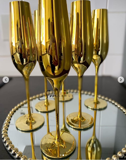 Gold champagne glasses