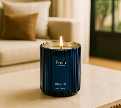 Scented wrapped candles in a luxury glass jar